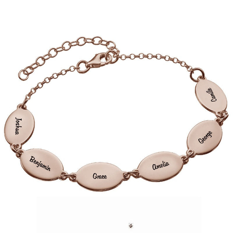 Rose gold personalized mom bracelet. Engraved oval name charms.