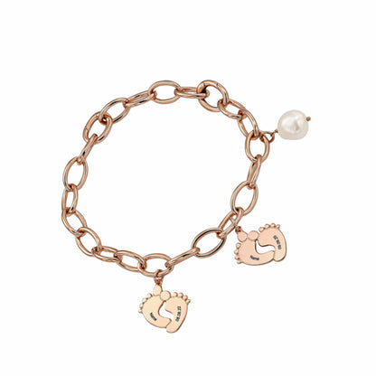 Rose gold personalized Mom Grandma baby feet bracelet. Engraved names, birth dates & pearl.