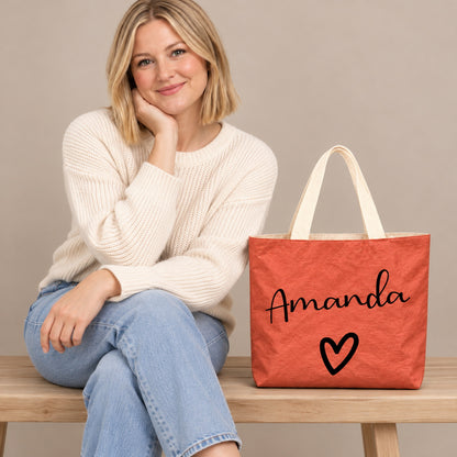 Personalized teacher tote with script name and bold heart design and custom name Amanda, custom name detail view.