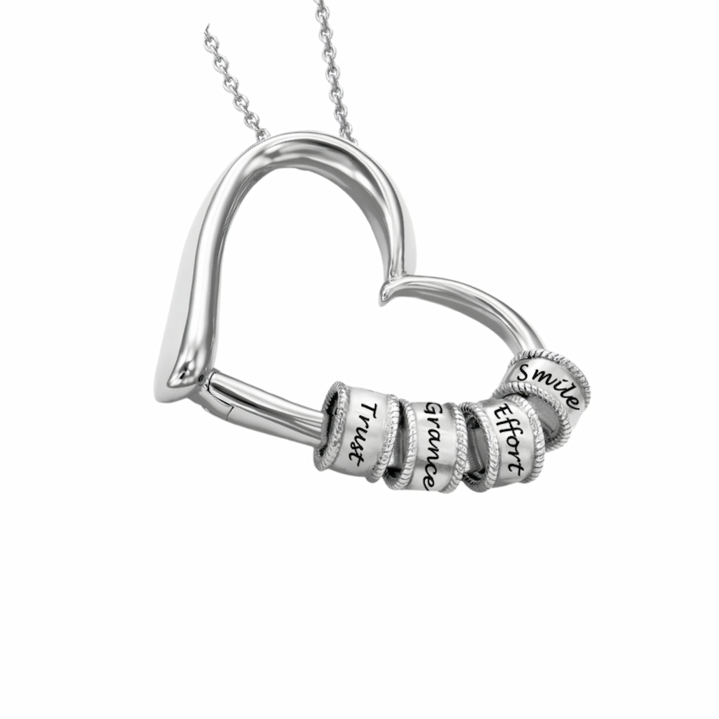 Detailed close-up of the sterling silver heart necklace showing the engraved stacking beads and the unique heart pendant design.