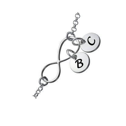 Close-up of 925 sterling silver infinity link with B & C initial charms.