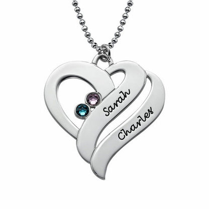 Front view of the silver two hearts forever necklace with custom names and birthstones on a ball chain.