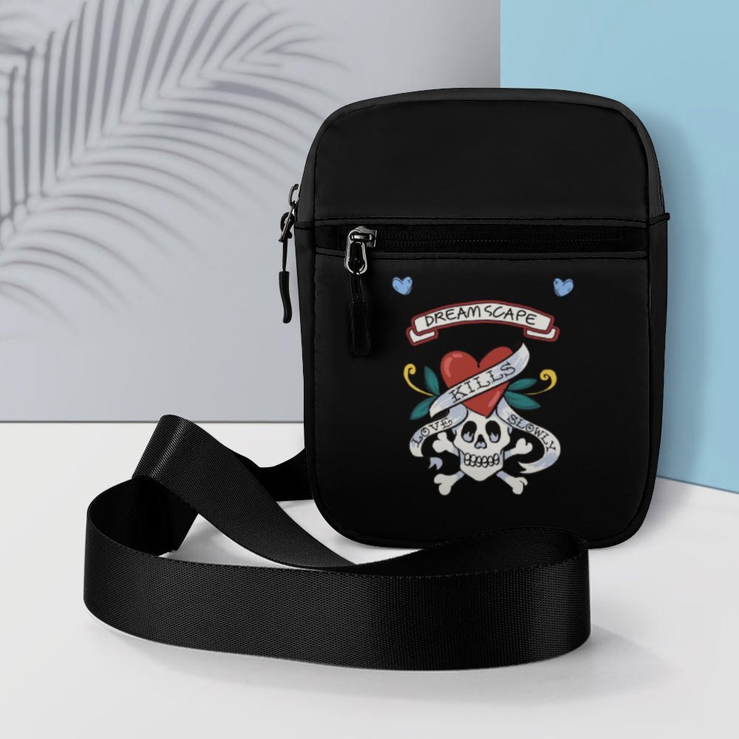 Small Messenger Bag featuring the custom Tattoo Art design and adjustable strap.