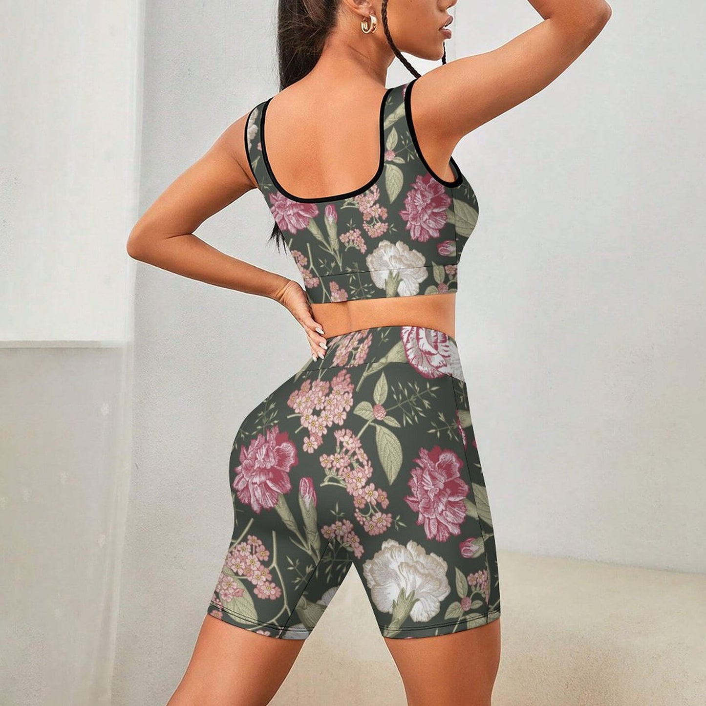 Sports bra and high waisted biker shorts set back view, floral tracksuit.