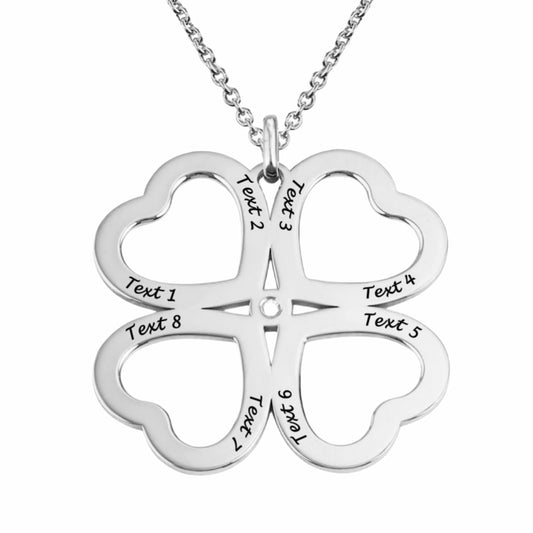Sterling silver personalized four leaf clover necklace with custom engraved names.
