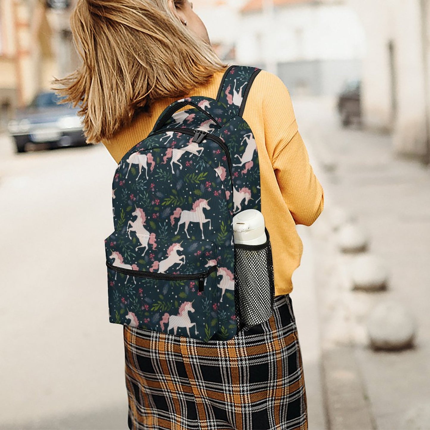 Stylish Personalized Kids Backpack for travel, worn by adult model.