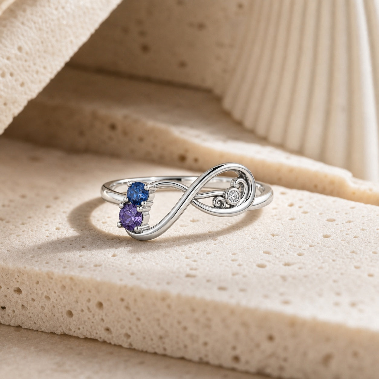 Two Birthstone Infinity Ring detail view custom jewelry