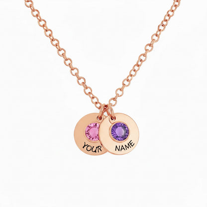 Rose gold custom 2 birthstone disc necklace with personalized text.