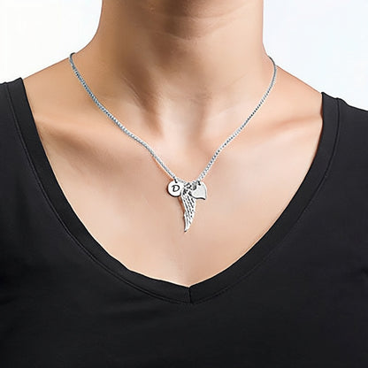 Woman wearing the 925 Sterling Silver Personalized Angel Wing Necklace.