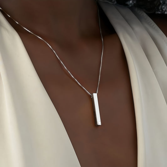 Woman wearing Personalized Sterling Silver Engraved Bar Necklace for couples.