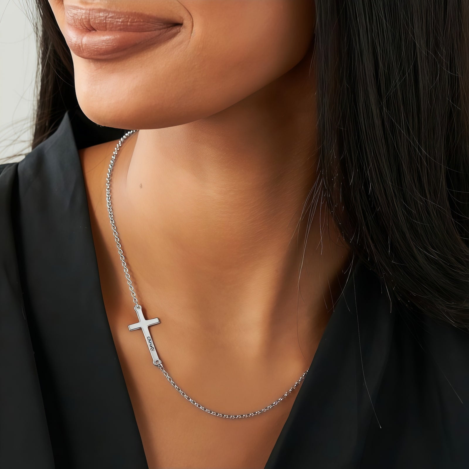 Woman wearing personalized sterling silver sideways cross choker necklace.