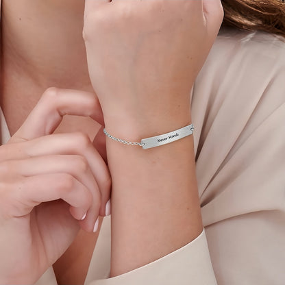 Woman wearing the Custom Dainty Bar Bracelet. Skinny Sterling Silver Coordinates Jewelry.